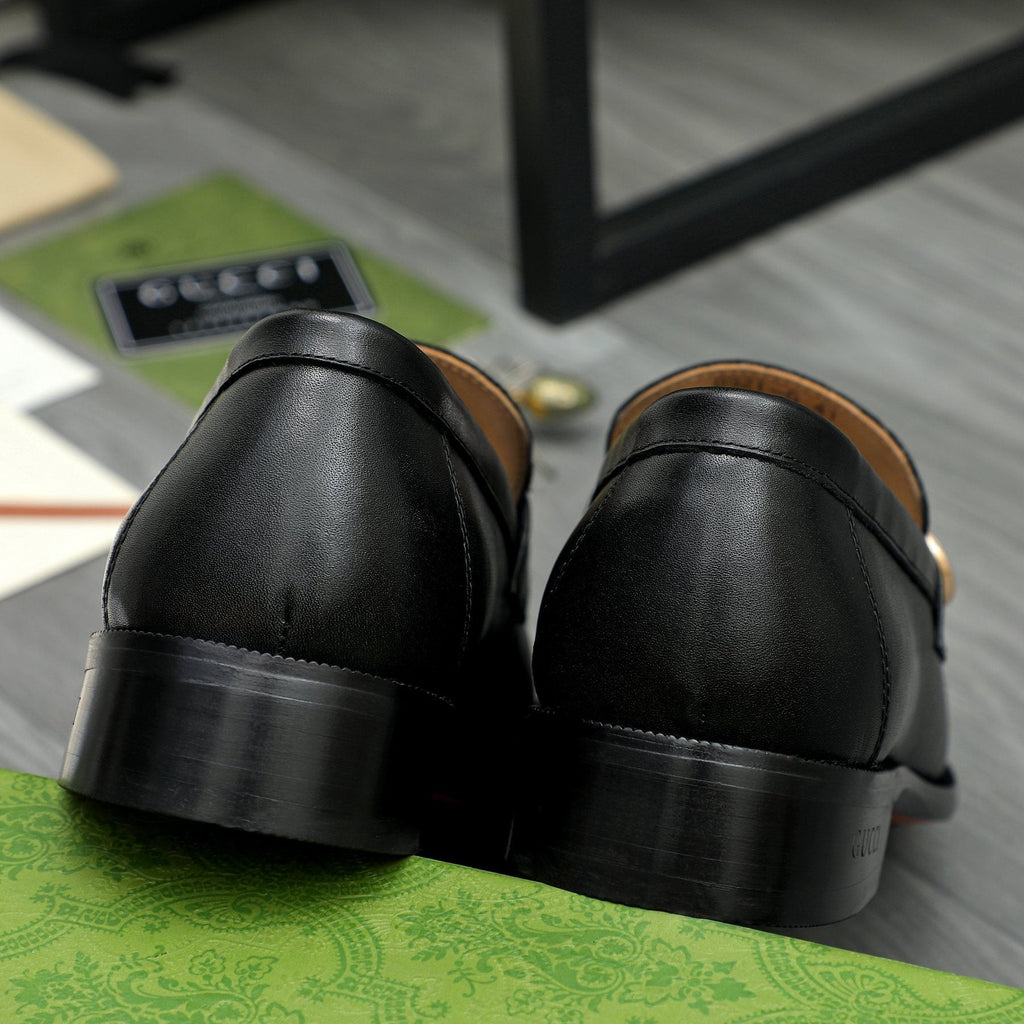 Gucci Black Embossed Loafers with Gold-Tone Detail